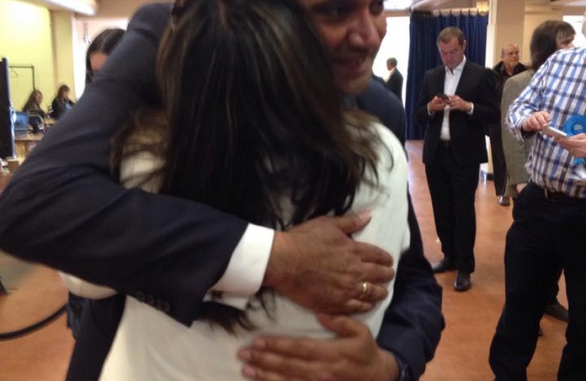 Manwinder Toor hugs his wife after winning St George's Hill by just 26 votes.